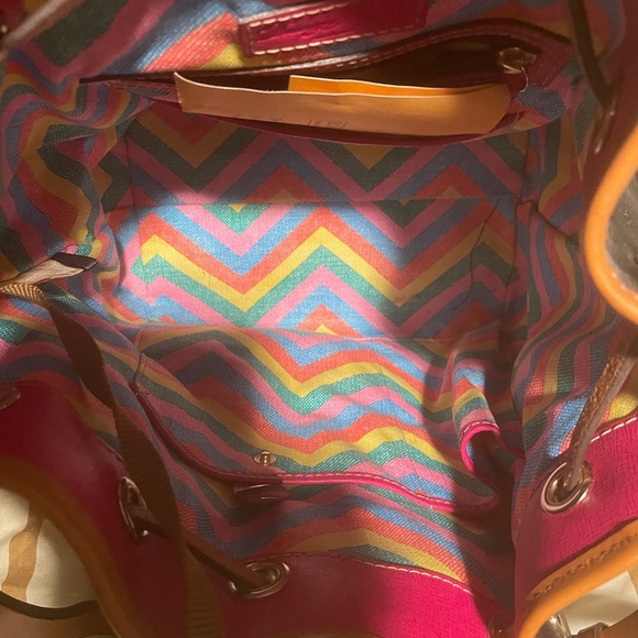 Dooney and Bourke, black and tan medium bucket bag with drawstring gently used - Picture 3 of 3